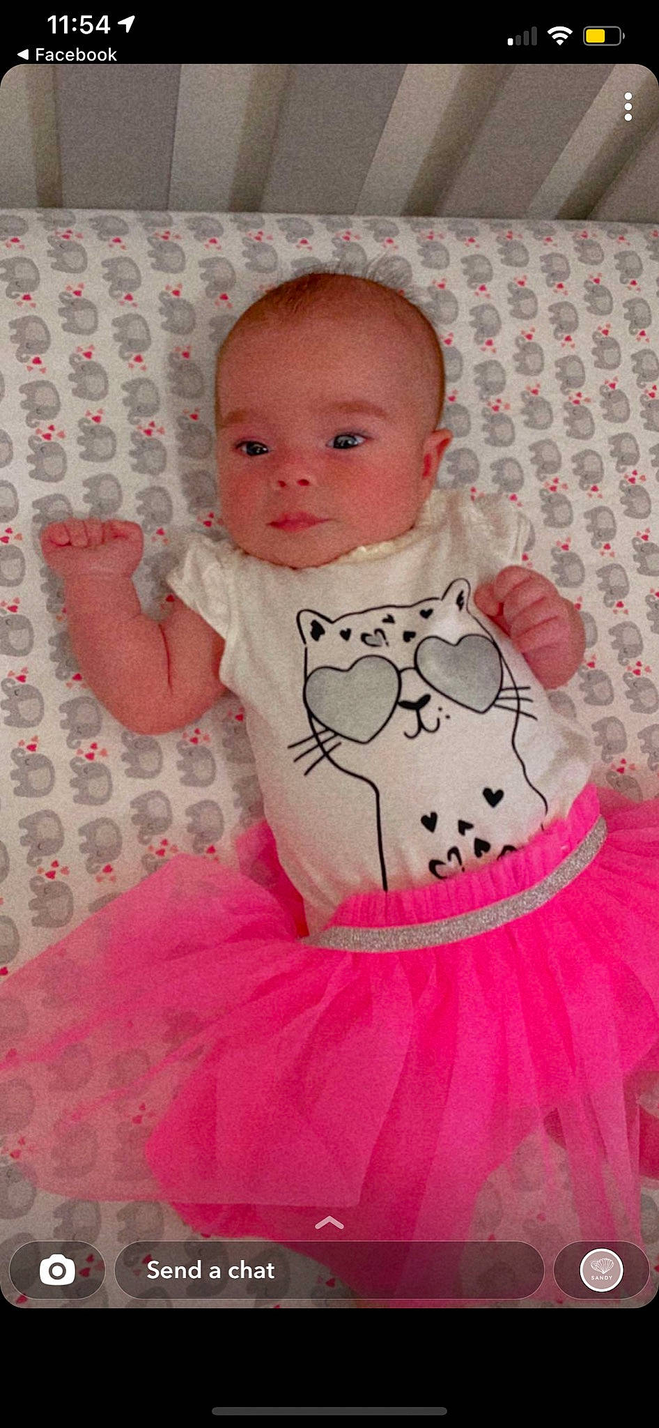 Luna is registered to the contest to win money with this photo: baby, baby_toddler_clothing, cheek, child, clothing, dress, eye, face, head, magenta, one_piece_garment, organ, pattern, person, pink, product, red, skin, sleeve, textile