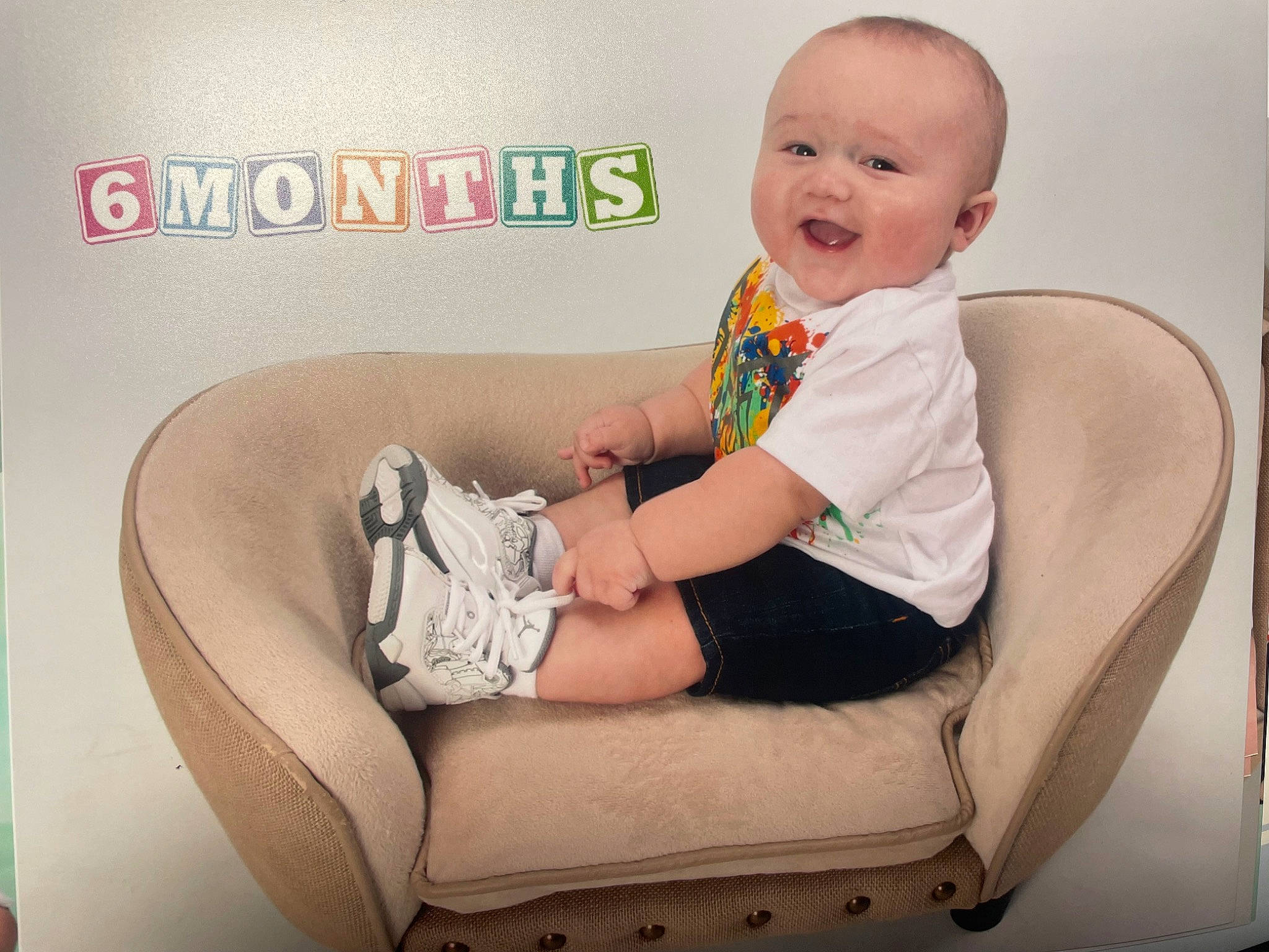 Joziah joined the competition — help win amazing prizes! baby, baby_toddler_clothing, child, comfort, flash_photography, happy, human_leg, knee, leisure, magenta, pattern, person, room, sitting, sleeve, smile, sock, t_shirt, thigh, toddler