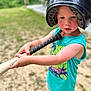 Porter is registered to the contest to win money with this photo: child, baseball, bat, helmet, outdoor, grass, sport, summer, toy, boy, playing, blue_shoes, tank_top, focus, determined, recreation, daylight, casual_clothing, young, fun
