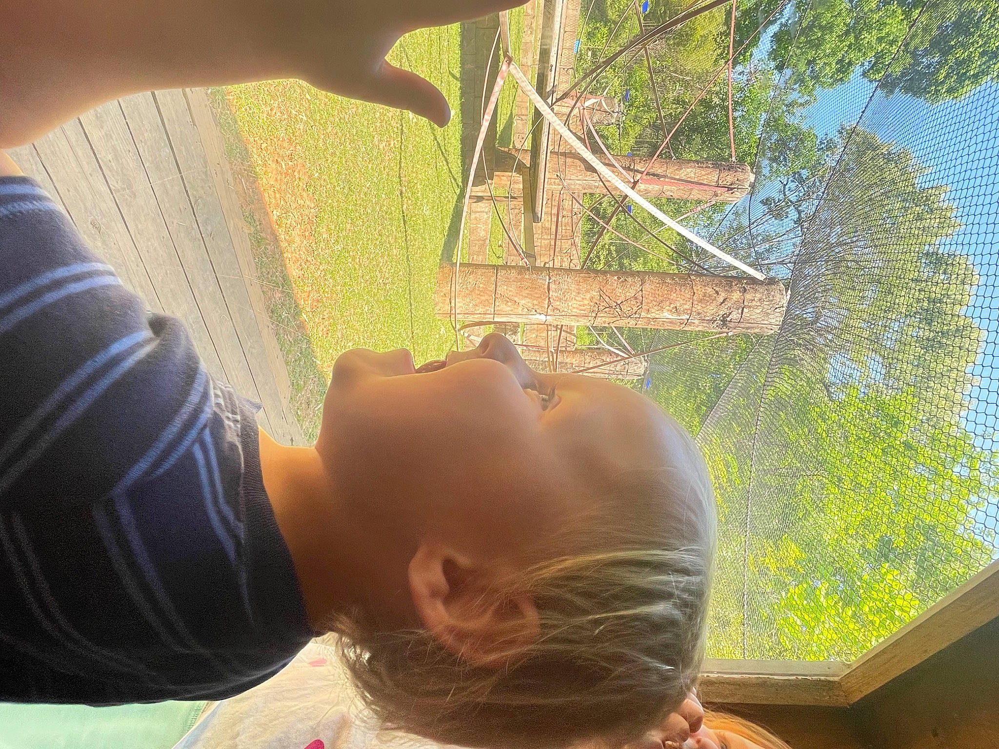 Houston is registered to the contest to win money with this photo: fun, grass, happy, hat, leaf, leisure, neck, people_in_nature, person, photograph, plant, skin, sunlight, t_shirt, tints_and_shades, toddler, tree, vehicle_door, window, wood