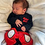 Kayden participe au concours pour gagner de l'argent avec cette photo : newborn, baby, sleeping, mickey_mouse, onesie, blanket, soft, cute, infant, clothing, yellow, red, black, person, indoors, resting, peaceful, child, portrait, cozy