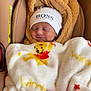 baby, sleeping, blanket, winnie_the_pooh, hat, car_seat, cozy, child, infant, cute, smiling, brown, white, soft, wrapped, hooded_blanket, peaceful, adorable, clothing, portrait