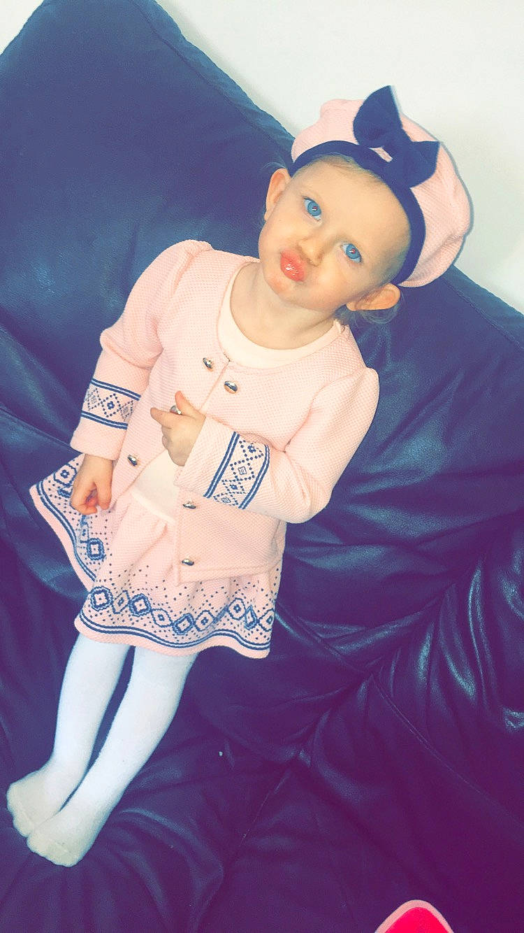 Elsie-rose is registered to the contest to win money with this photo: arm, beauty, black_hair, child, cool, costume, ear, fashion, forehead, leg, person, pink, skin, style, t_shirt, thigh, white