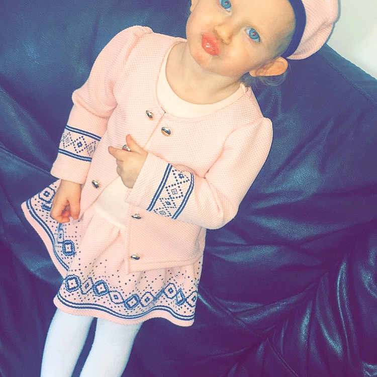 Elsie-rose is registered to the contest to win money with this photo: arm, beauty, black_hair, child, cool, costume, ear, fashion, forehead, leg, person, pink, skin, style, t_shirt, thigh, white