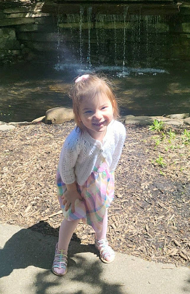 Primrose is registered to the contest to win money with this photo: baby, baby_toddler_clothing, barefoot, child, foot, fun, garden, grass, happy, joy, leisure, people_in_nature, person, play, recreation, sandal, sitting, skin, smile, soil