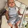 Alix a rejoint le concours — aidez-le/la à gagner de superbes lots ! baby, casual, changing_pad, child, curious, cute, diapers, eyes, face, feet, hands, indoor, infant, newborn, overalls, person, quilted_surface, soft_toys, striped_clothing, wipes