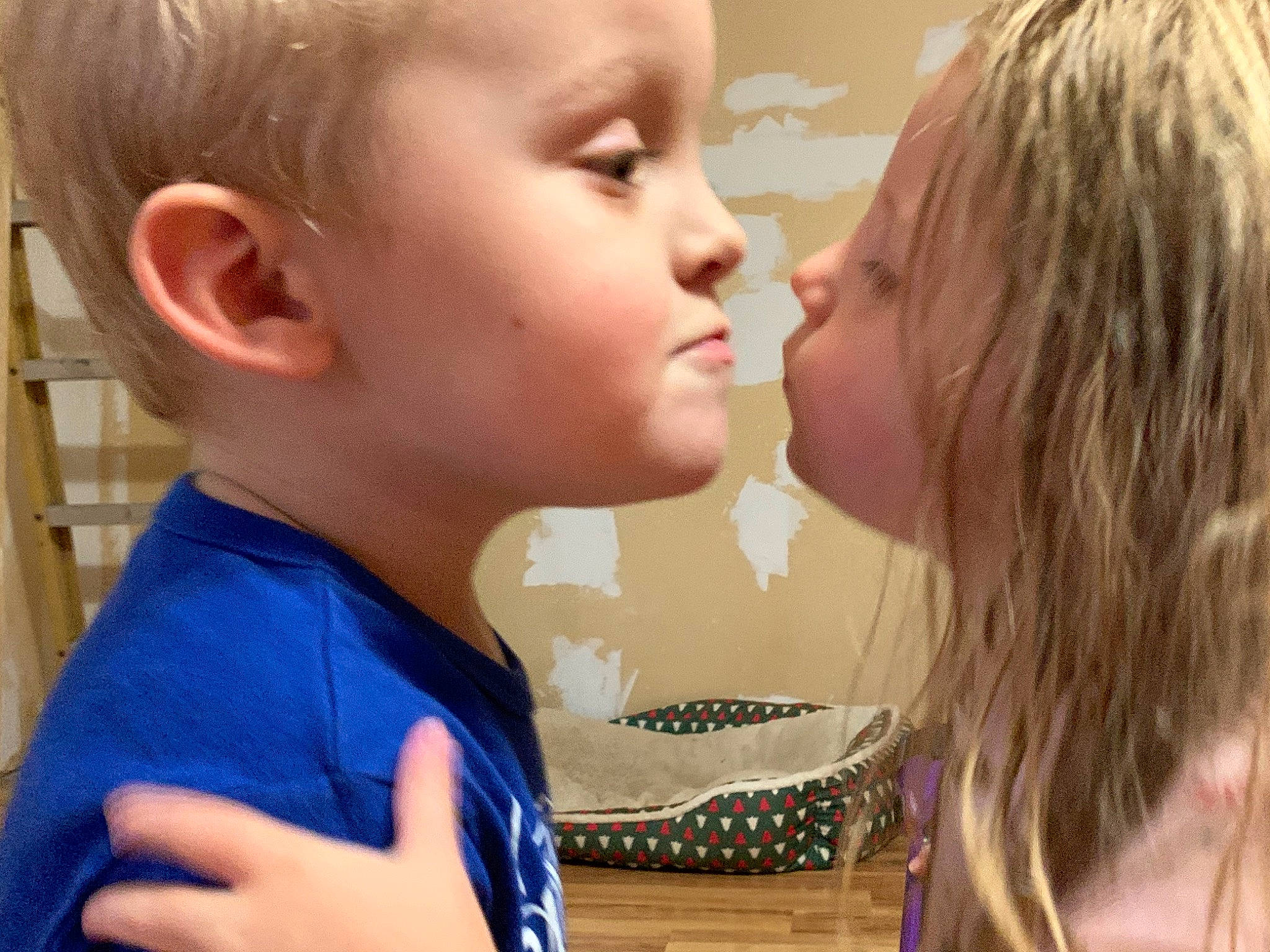 Jaxson is registered to the contest to win money with this photo: baby, blond, brown_hair, cheek, cheek_kissing, ear, eyelash, forehead, gesture, hairstyle, head, holiday, interaction, kiss, lip, love, neck, person, romance, sharing
