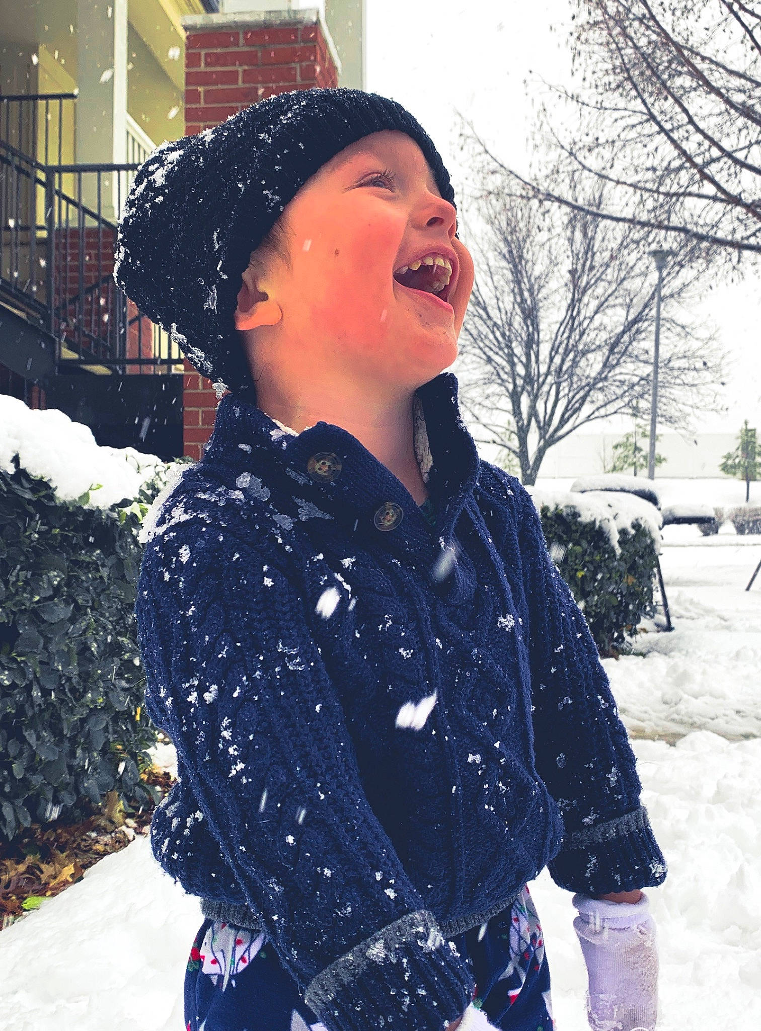 Jaxson Radford is registered to the contest to win money with this photo: blizzard, bonnet, freezing, frost, headwear, hood, ice, jacket, jheri_curl, person, playing_in_the_snow, precipitation, snow, street_fashion, tongue, winter, winter_storm