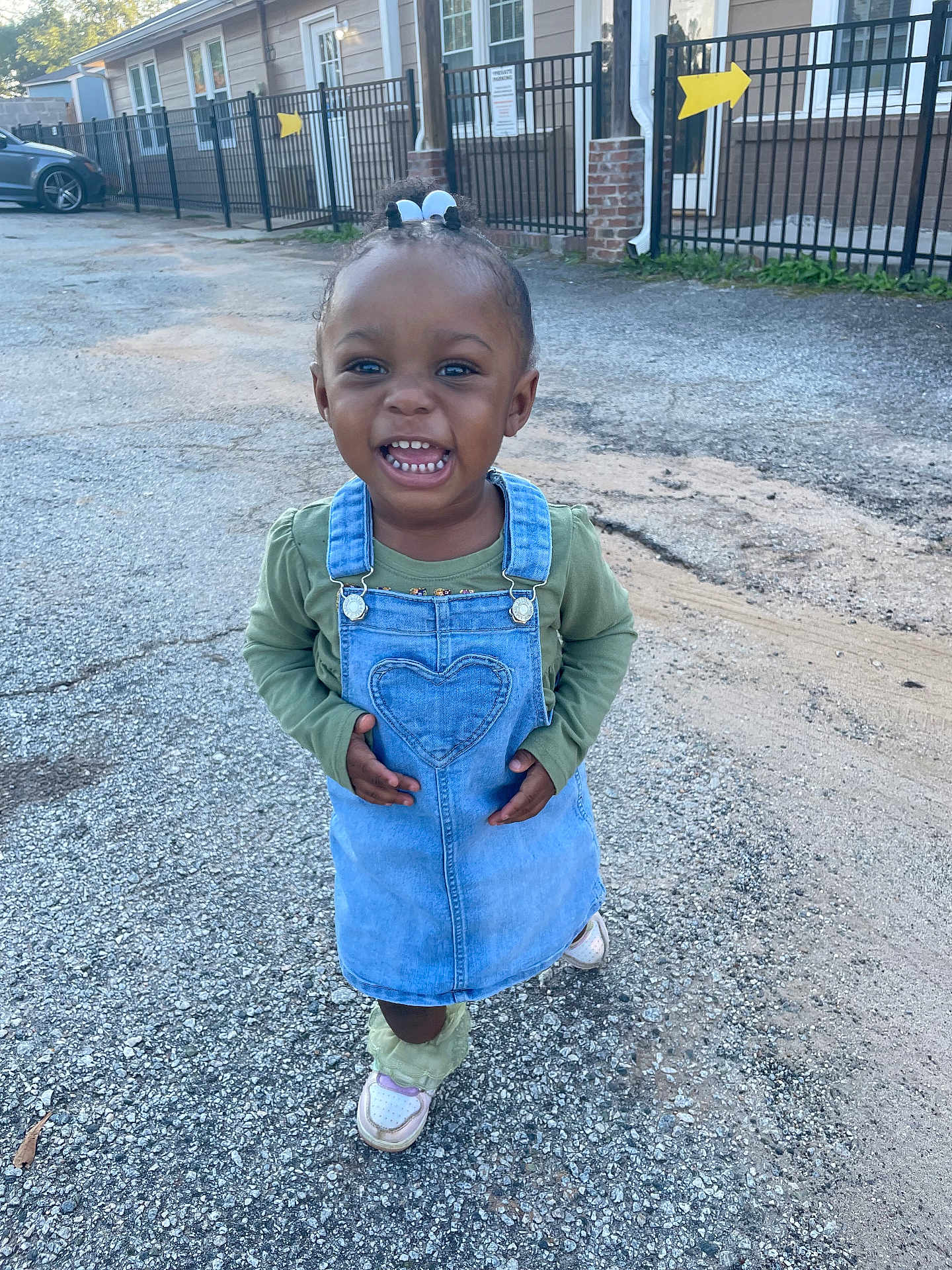 Alora joined the competition — help win amazing prizes! child, city, clothing, coat, face, female, girl, happy, head, jacket, jeans, pants, path, person, photography, portrait, road, street, urban, walking