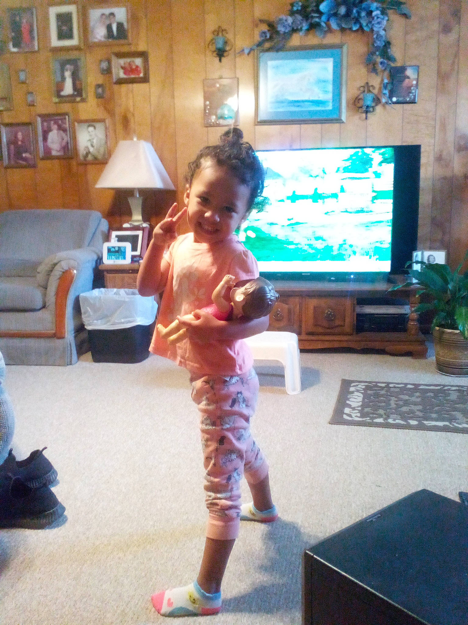 Arianah joined the competition — help win amazing prizes! blue, child, couch, display_device, event, flat_panel_display, floor, flooring, fun, houseplant, joy, lamp, leisure, living_room, person, picture_frame, plant, room, television, television_set