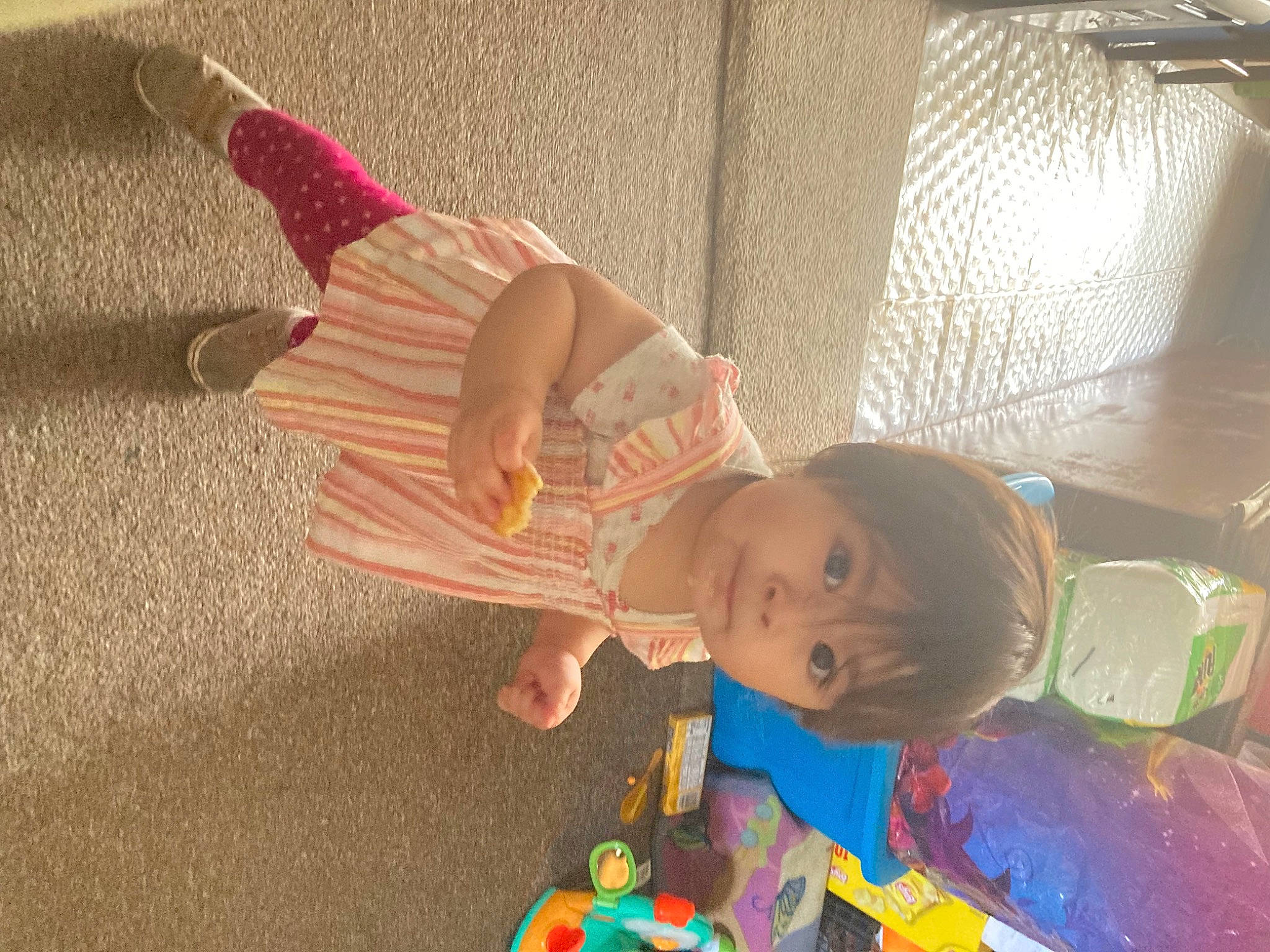 Maria is registered to the contest to win money with this photo: baby, baby_products, baby_toys, child, flooring, fun, happy, leisure, party_supply, person, plastic, play, room, toddler, toy, wood