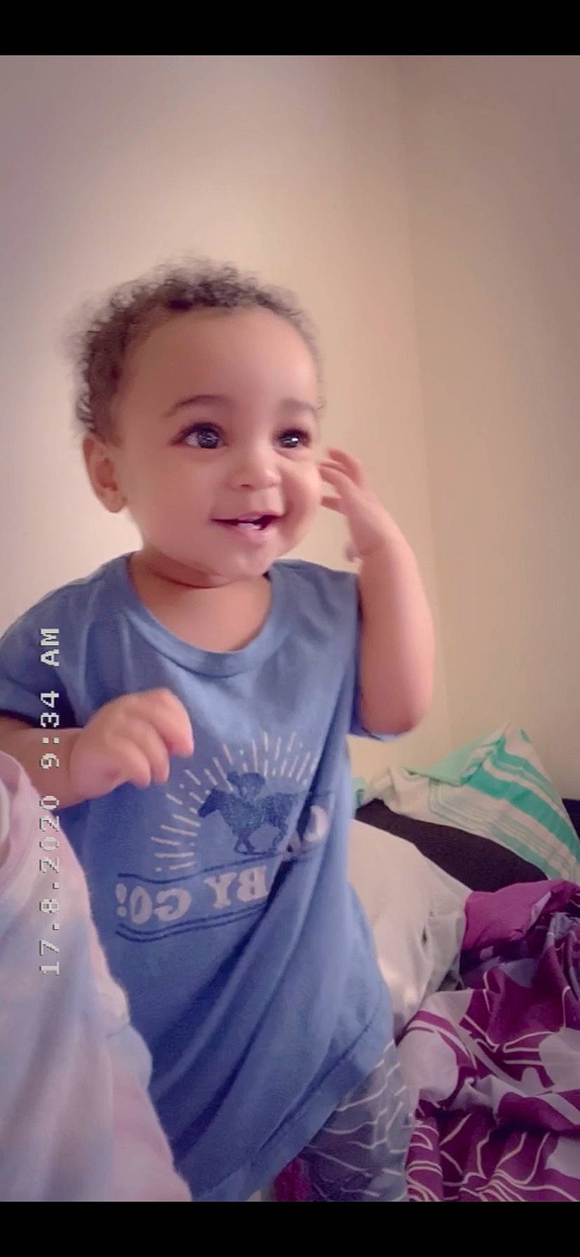 Jamere is registered to the contest to win money with this photo: arm, baby, cheek, child, ear, eye, finger, gesture, iris, joy, nose, person, sitting, skin, smile, thumb, toddler