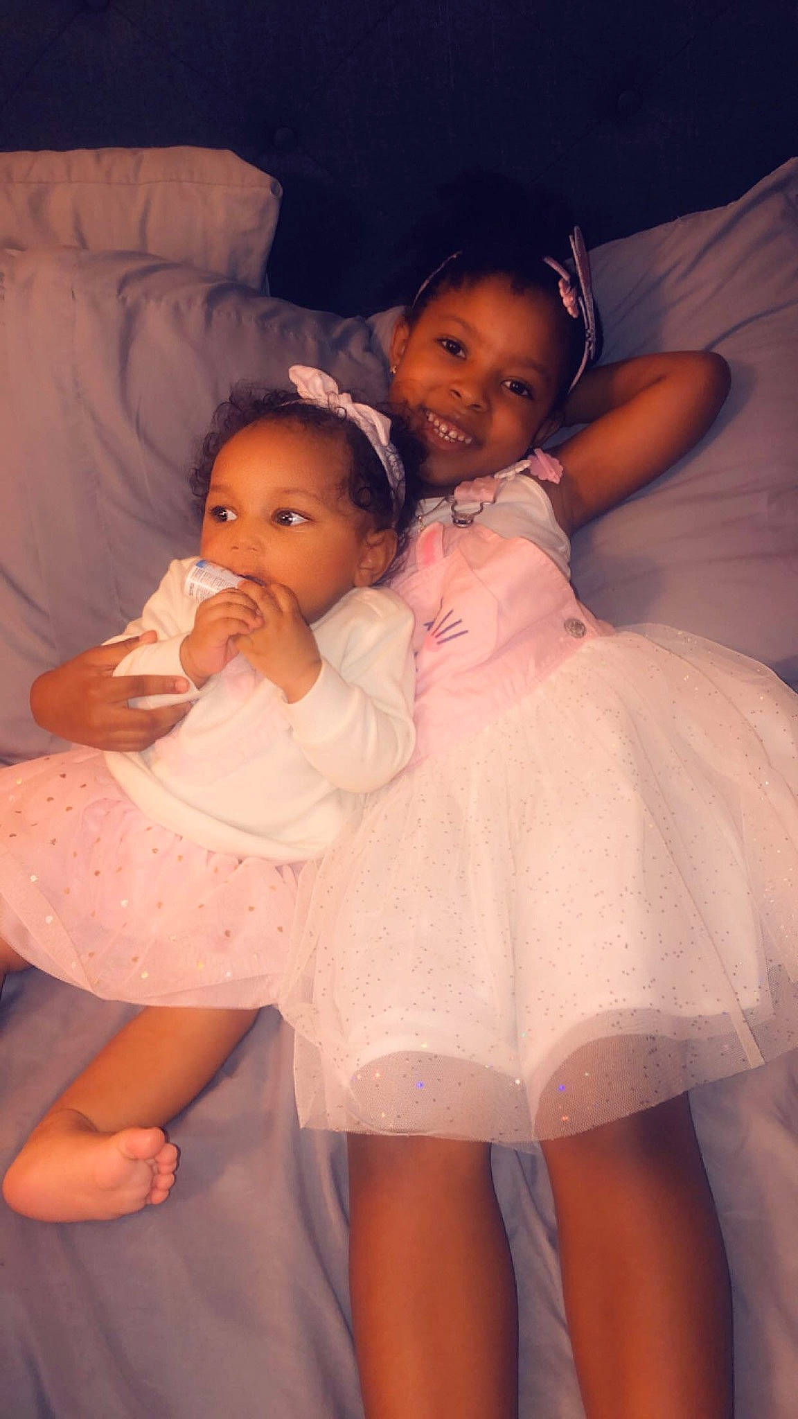 Amiyah Jade is registered to the contest to win money with this photo: baby, cheek, child, eye, finger, fun, happy, iris, joy, lip, person, pink, product, sibling, skin, smile, toddler