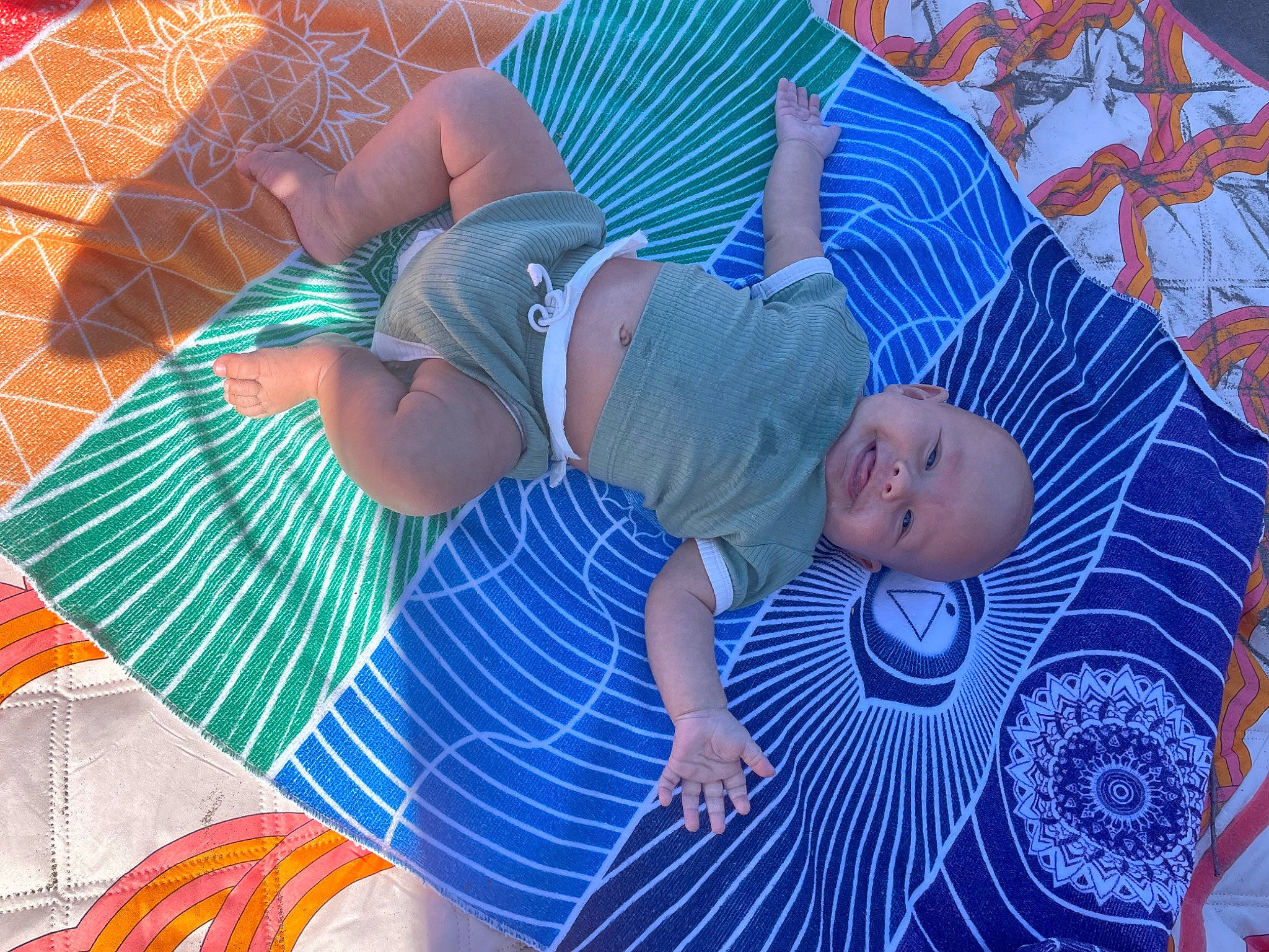 Bearon joined the competition — help win amazing prizes! azure, baby, baby_toddler_clothing, blue, child, comfort, electric_blue, flooring, fun, grass, hat, leisure, linens, pattern, person, sitting, sunglasses, t_shirt, textile, toddler