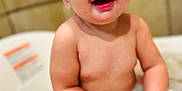 Mia is registered to the contest to win money with this photo: baby, bath, bubbles, foam, smile, child, water, tub, happy, skin, cute, indoors, person, playful, clean, bathroom, joy, sitting, young, fun