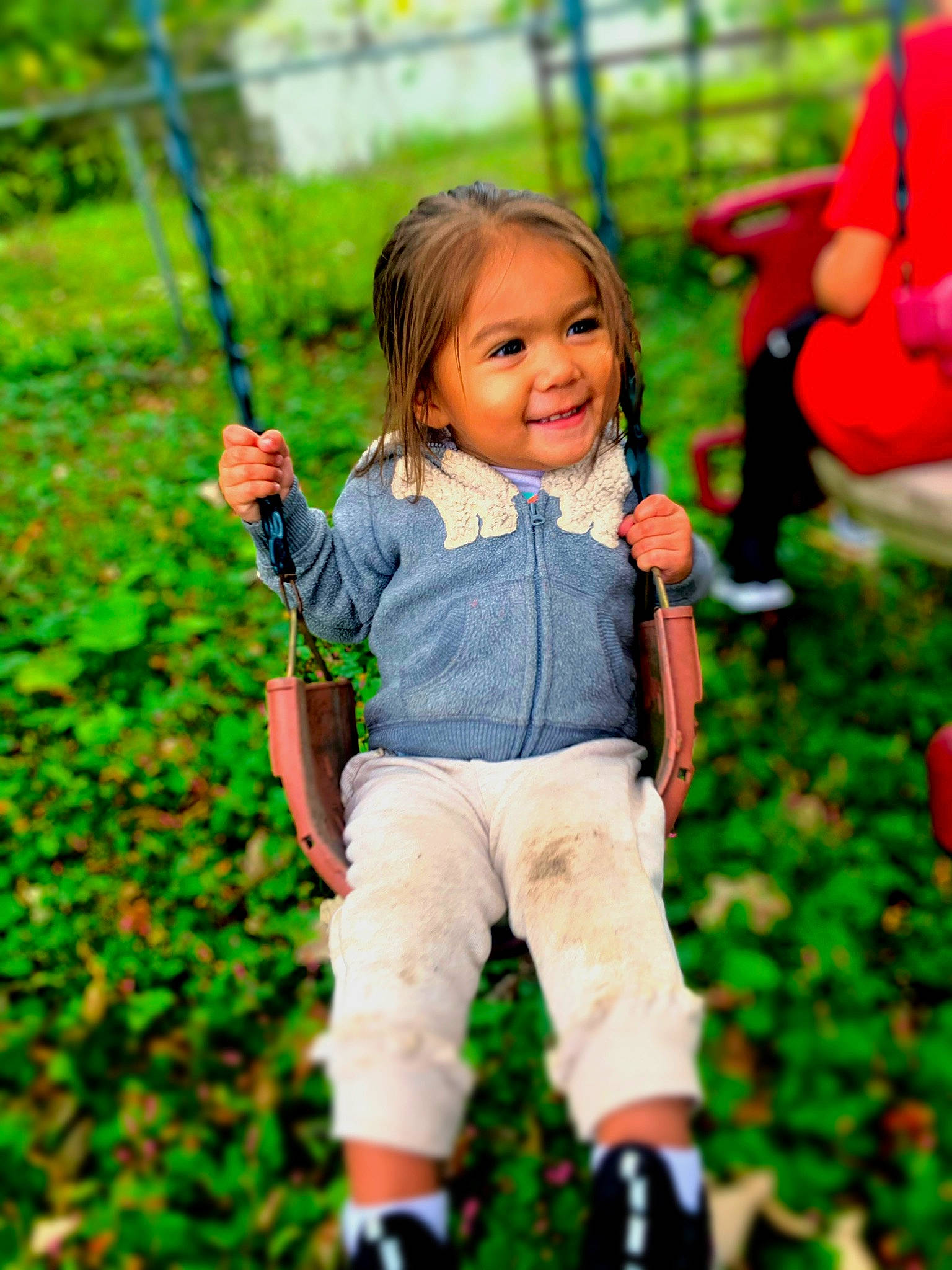 Adelina is registered to the contest to win money with this photo: baby_toddler_clothing, child, face, fun, grass, green, happy, joy, leaf, leisure, nature, people_in_nature, person, plant, public_space, recreation, red, shorts, skin, smile