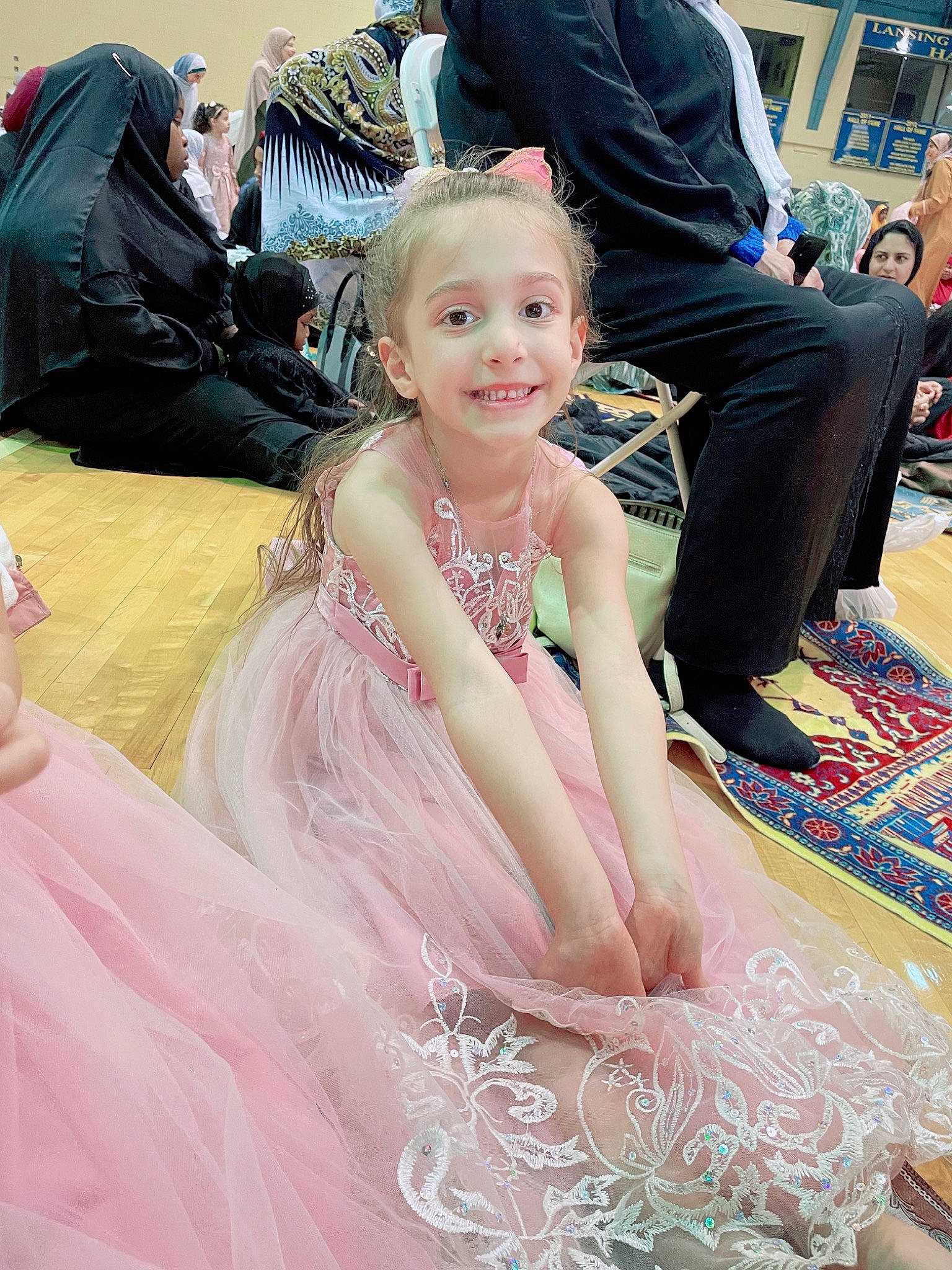 Claire joined the competition — help win amazing prizes! bridal_accessory, bridal_clothing, child, clothing, embellishment, event, fashion_design, formal_wear, fun, gown, happy, joy, leisure, magenta, necklace, person, pink, public_event, recreation, sitting