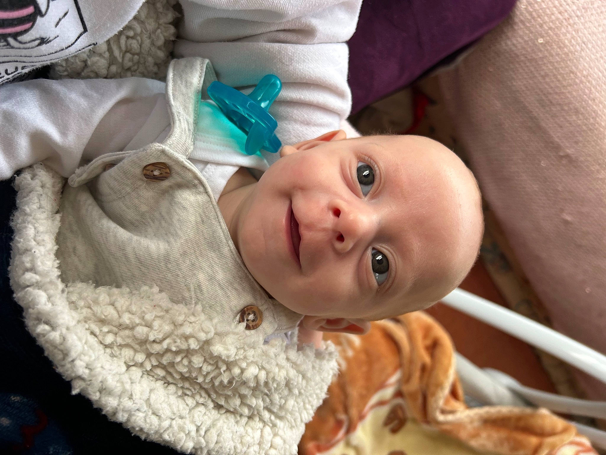 Hendrix is registered to the contest to win money with this photo: baby, baby_toddler_clothing, cheek, child, comfort, eye, eyelash, face, hat, head, human_body, iris, lip, nose, outerwear, person, skin, sleeve, smile, toddler