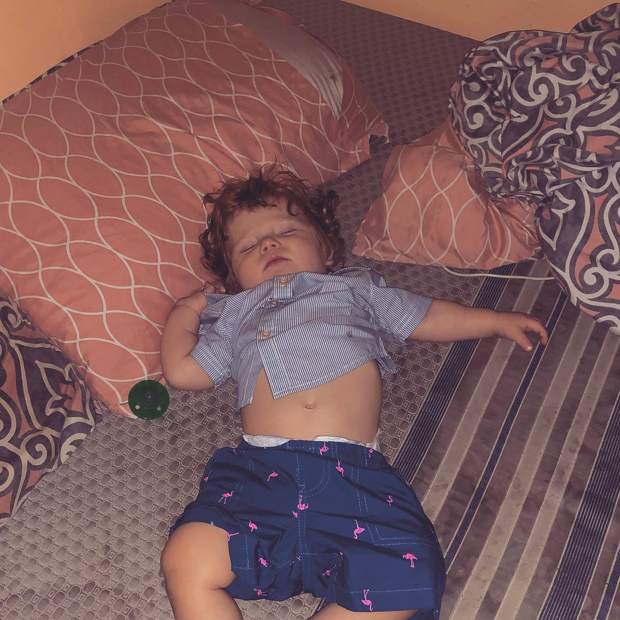 Gary is registered to the contest to win money with this photo: abdomen, black_hair, child, flesh, fun, hip, human_leg, leg, long_hair, pattern, person, skin, stomach, thigh, toddler, trunk