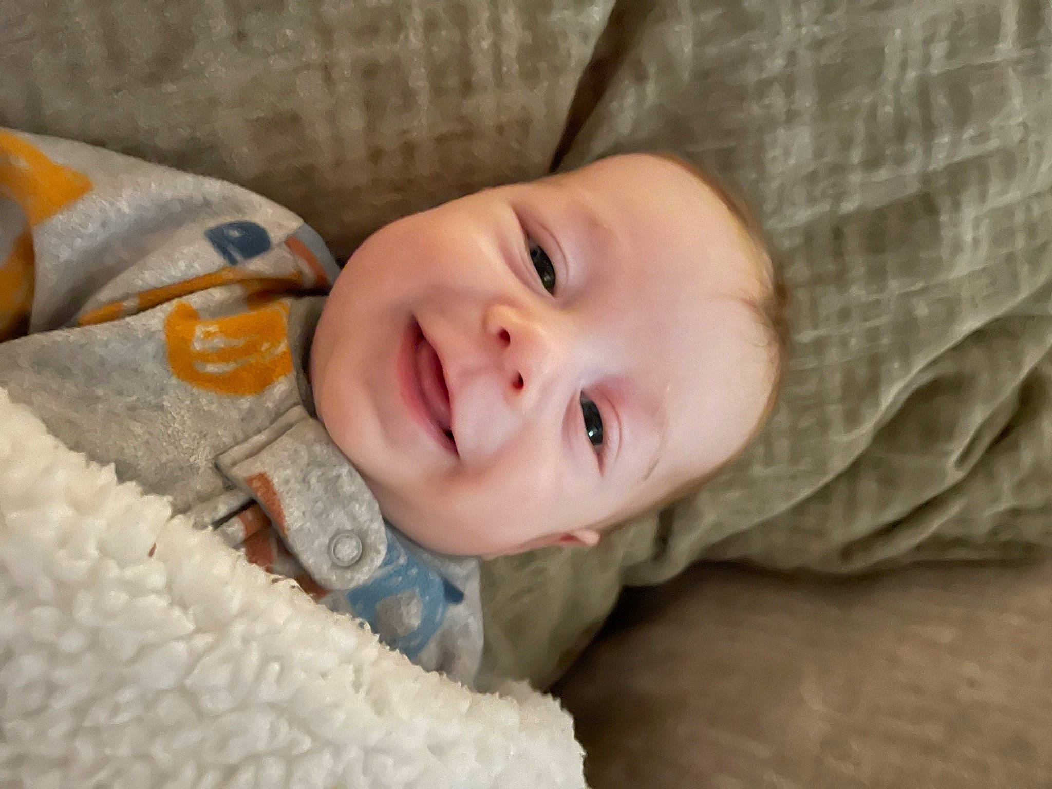 Kane joined the competition — help win amazing prizes! baby, baby_laughing, baby_toddler_clothing, cheek, child, close_up, comfort, eye, eyebrow, facial_expression, happy, iris, lip, mouth, nose, person, skin, sleeve, smile, textile