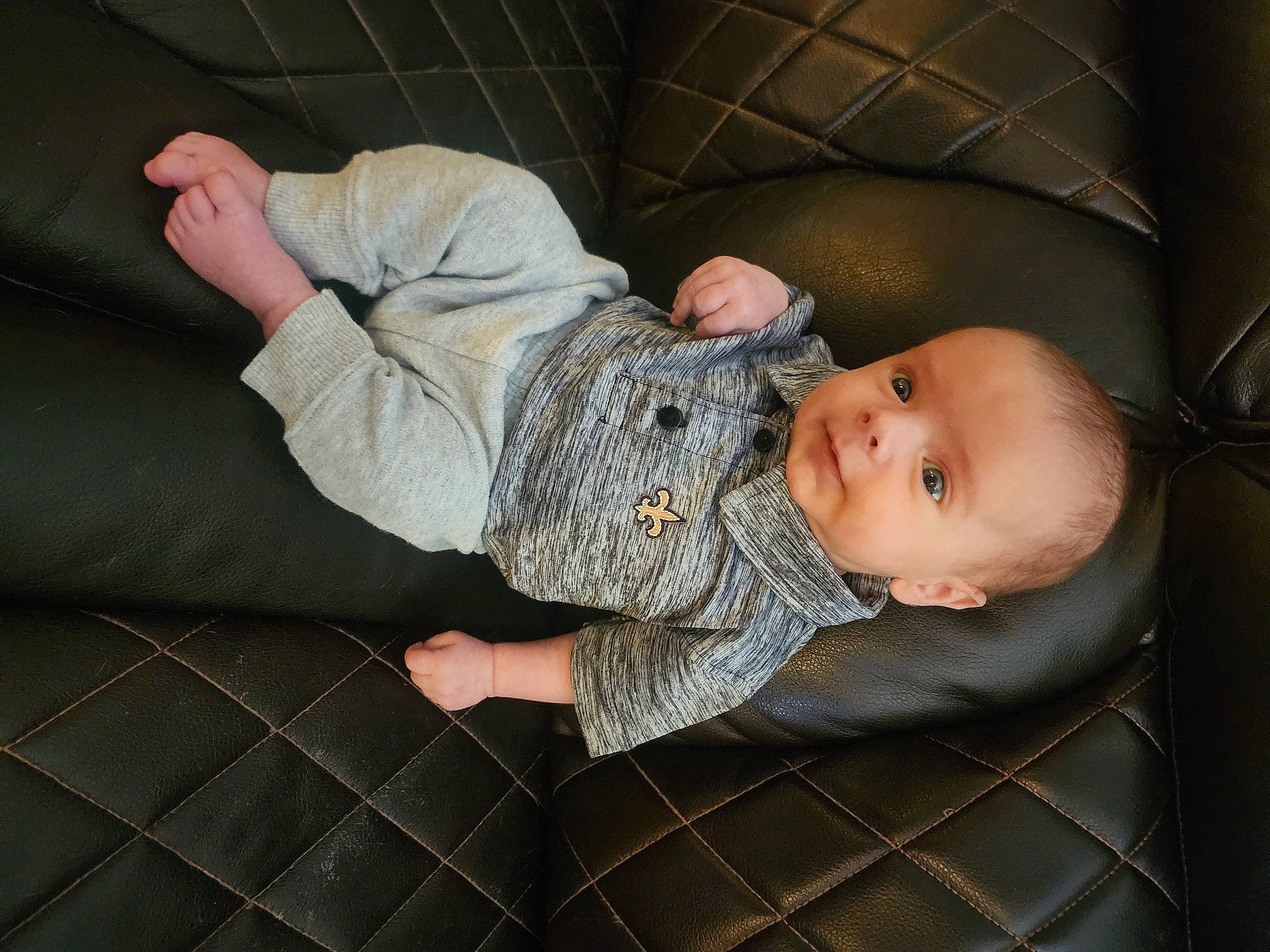 Christopher joined the competition — help win amazing prizes! baby, baby_products, baby_safety, baby_toddler_clothing, cheek, child, comfort, flooring, foot, linens, pattern, person, room, sitting, skin, sleep, sleeve, sock, thumb, toddler