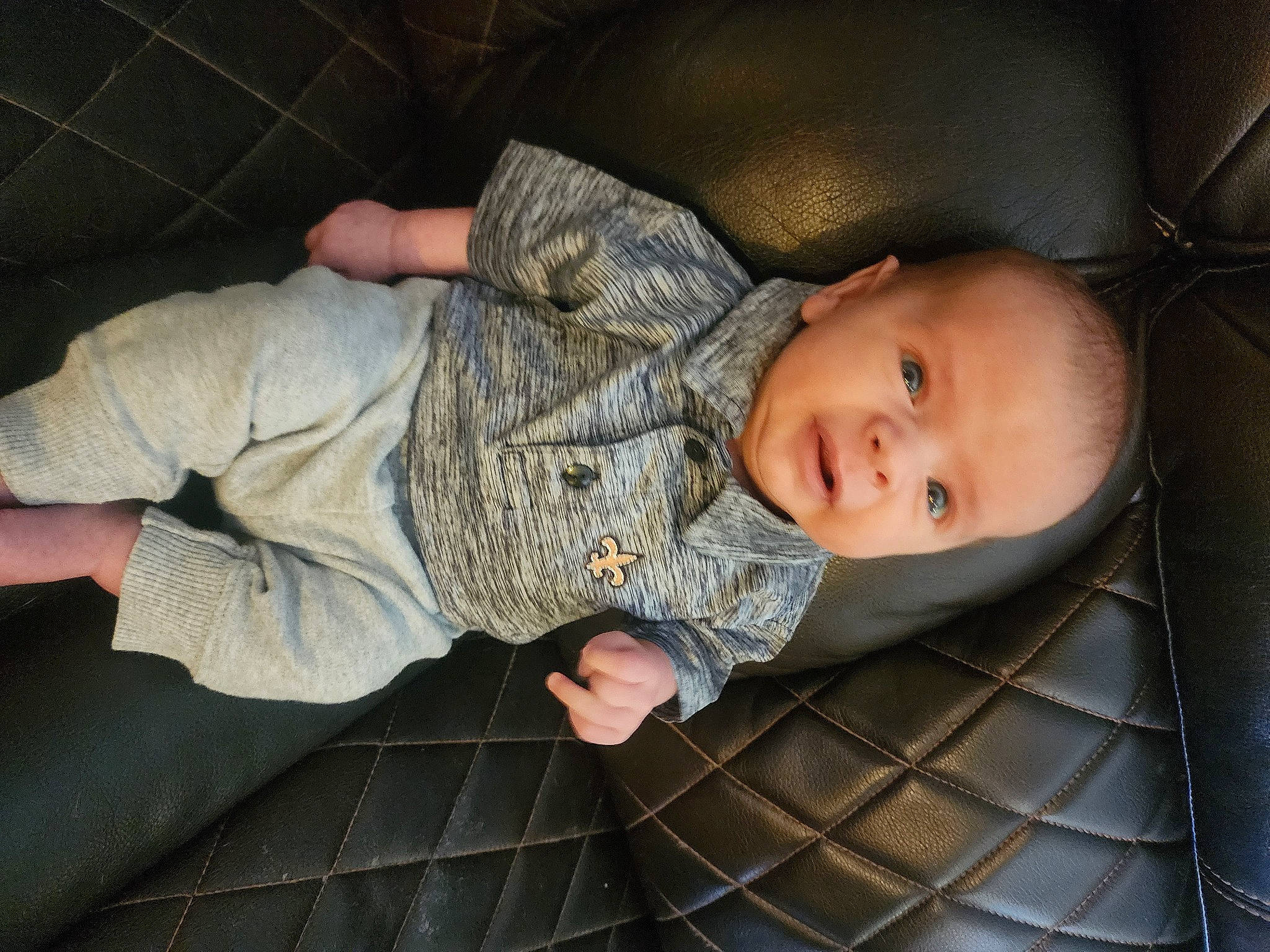 Christopher is registered to the contest to win money with this photo: baby, baby_products, baby_safety, baby_toddler_clothing, cheek, child, comfort, eye, foot, fun, head, mouth, nose, pattern, person, sitting, skin, sleep, toddler, vertebrate