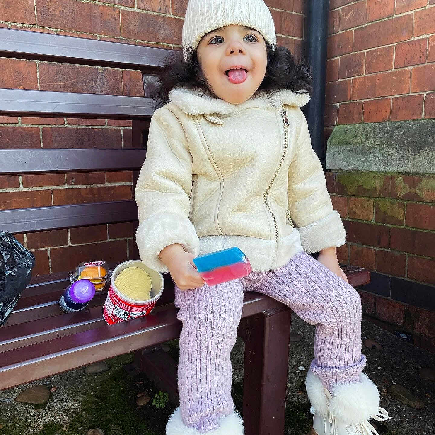 Cataleya Maya joined the competition — help win amazing prizes! child, clothing, eating, face, female, food, girl, happy, head, hoodie, hosiery, knitwear, pants, person, sitting, sock, sweater, sweatshirt, tape, yawning