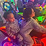 Jaquale joined the competition — help win amazing prizes! child, arcade, game, motorcycle, neon_lights, indoor, fun, smile, playing, people, jacket, hair, technology, entertainment, toy, young, happy, crowd, colorful, leisure