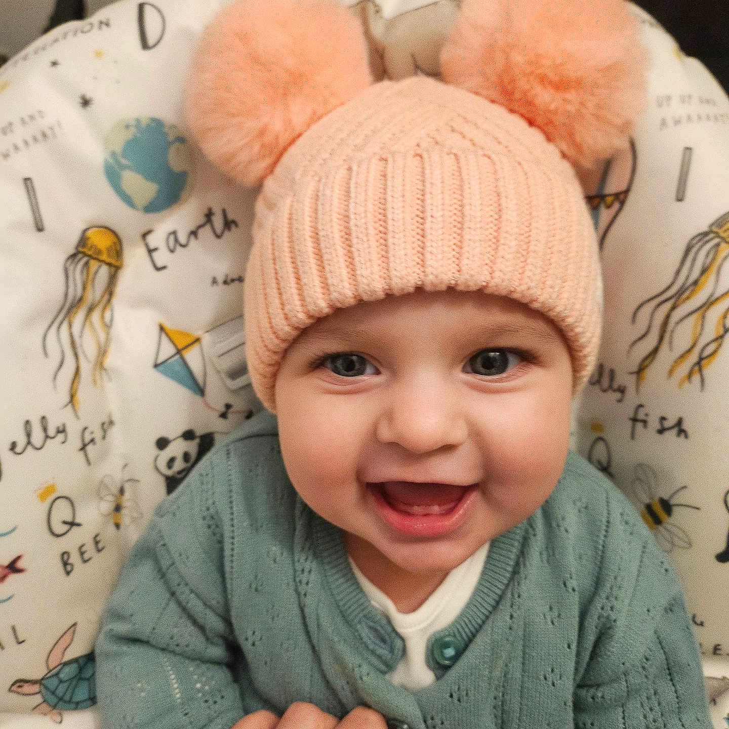 Ariana Sophia joined the competition — help win amazing prizes! baby, beanie, bodypart, bonnet, cap, clothing, couch, face, finger, furniture, hand, happy, hat, head, knitwear, person, photography, portrait, smile, sweater