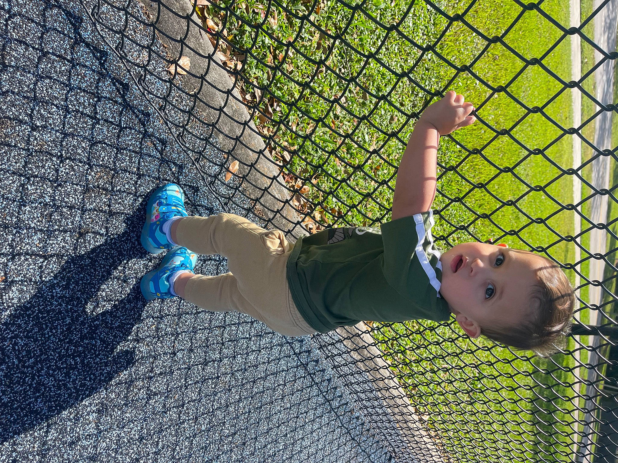 Marco joined the competition — help win amazing prizes! asphalt, chain_link_fencing, concrete, electric_blue, fence, fun, grass, knee, leisure, mesh, net, pattern, people_in_nature, person, player, recreation, road_surface, shadow, surprise, t_shirt