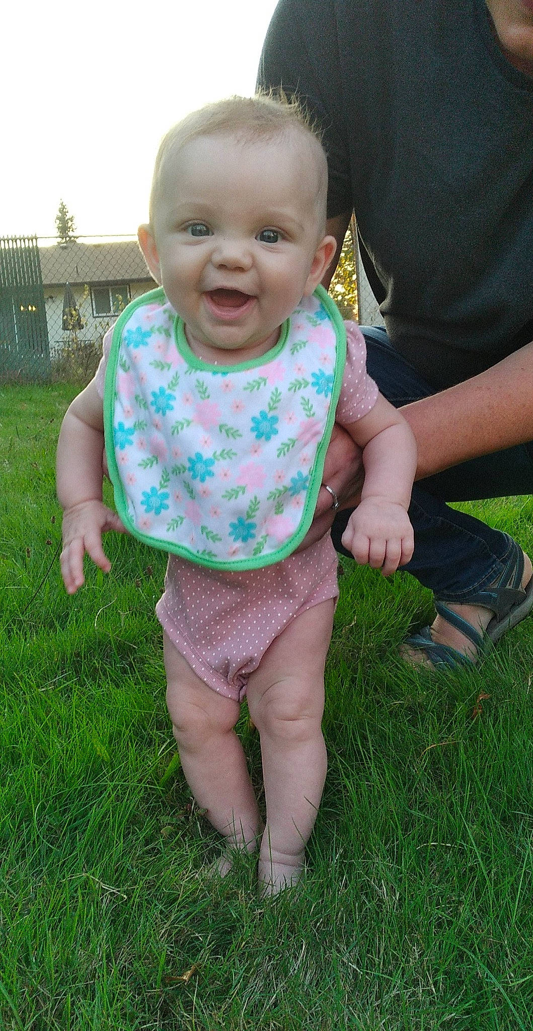 Jazmine is registered to the contest to win money with this photo: baby, baby_toddler_clothing, cheek, child, eye, finger, hand, head, human, human_body, mammal, mouth, nose, organ, person, pink, skin, sock, thumb, toddler