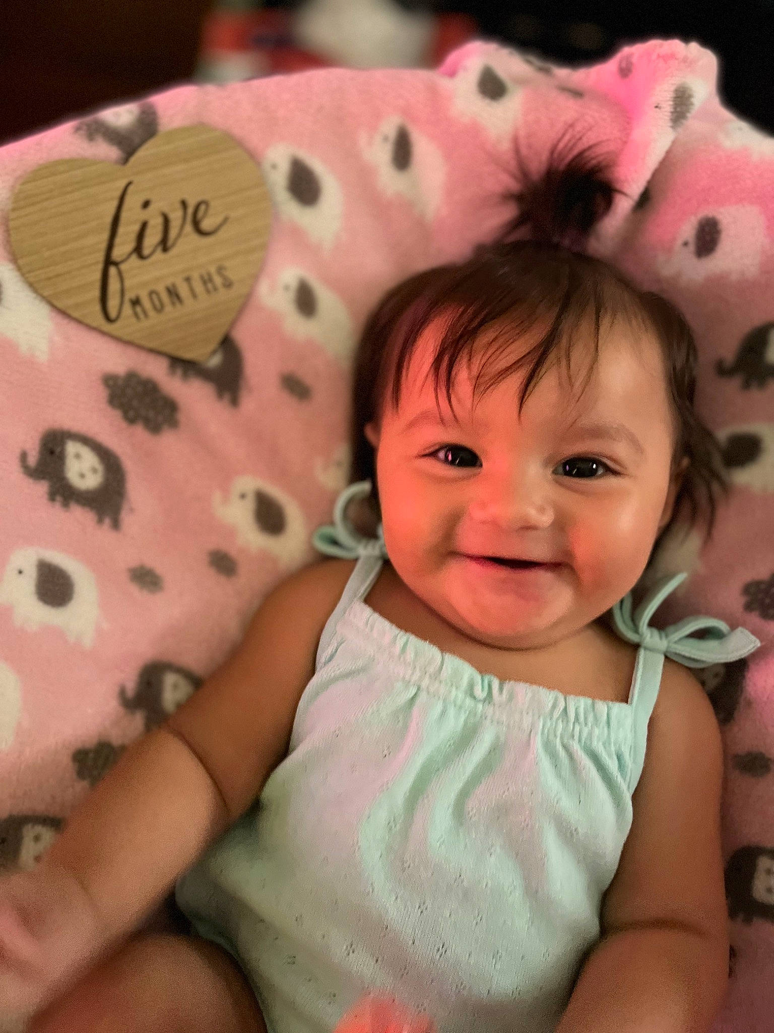 Aida is registered to the contest to win money with this photo: baby, baby_products, baby_toddler_clothing, cheek, child, design, eye, face, happy, head, joy, linens, magenta, pattern, person, pink, product, skin, sleeve, smile