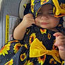 Sally joined the competition — help win amazing prizes! baby, car_seat, child, closeup, clothing, comfort, cute, dress, face, hand, hat, headwear, indoors, infant, peaceful, portrait, resting, sleeping, sunflower_pattern, yellow_bow