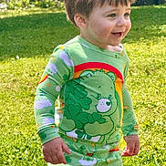 Preston joined the competition — help win amazing prizes! care_bears, casual, child, clothing, cute, daylight, fashion, fun, grass, green_pajamas, happy, nature, outdoor, person, playful, portrait, smiling, sunlight, toddler, young_child