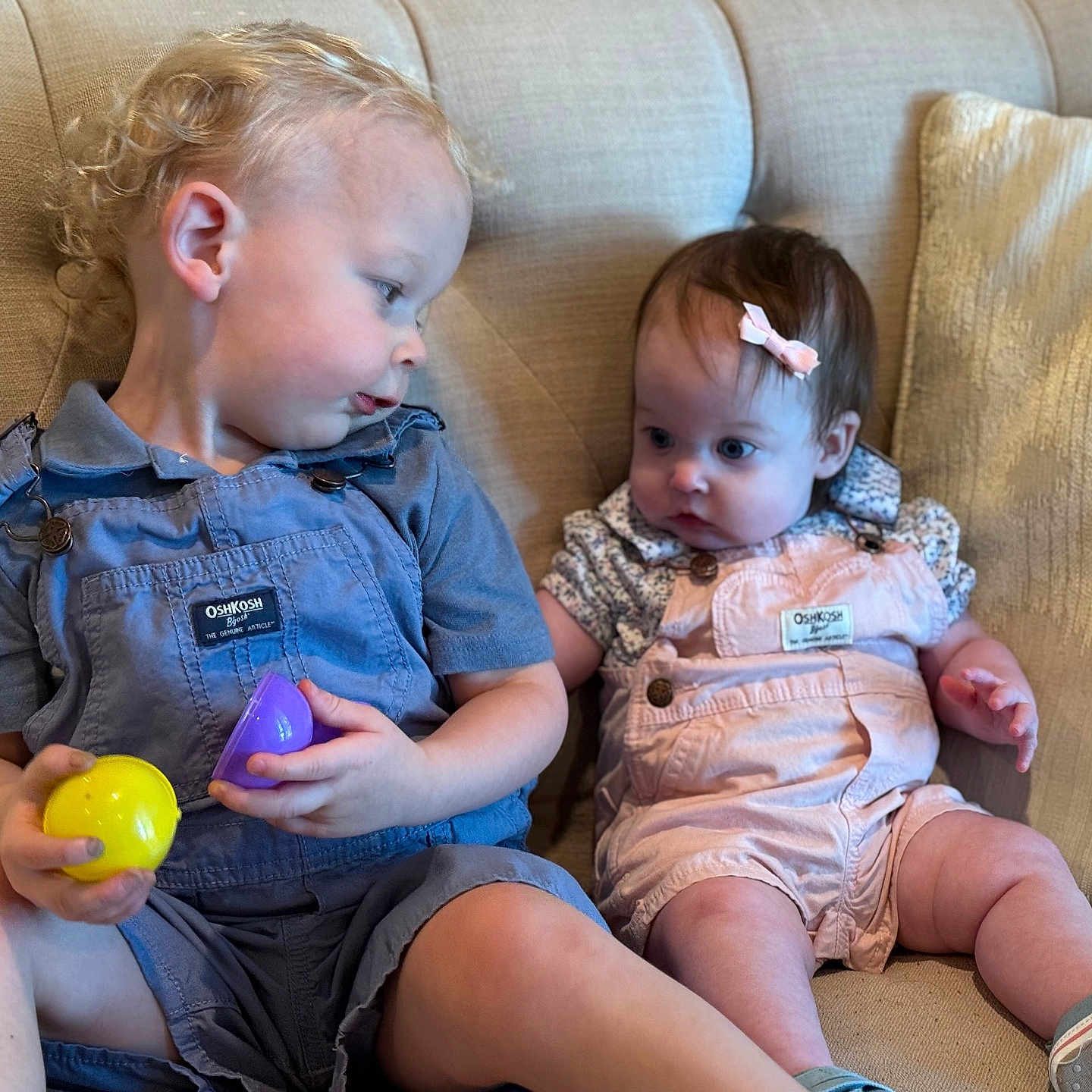 Veridian is registered to the contest to win money with this photo: baby, citrusfruit, clothing, couch, cushion, face, food, footwear, fruit, furniture, head, homedecor, pants, person, photography, plant, portrait, produce, shoe, shorts