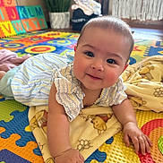 Eden joined the competition — help win amazing prizes! baby, child, smiling, face, blanket, playmat, alphabet, colorful, indoor, cute, infant, clothing, person, toddler, soft, happy, floor, home, puzzle, toy