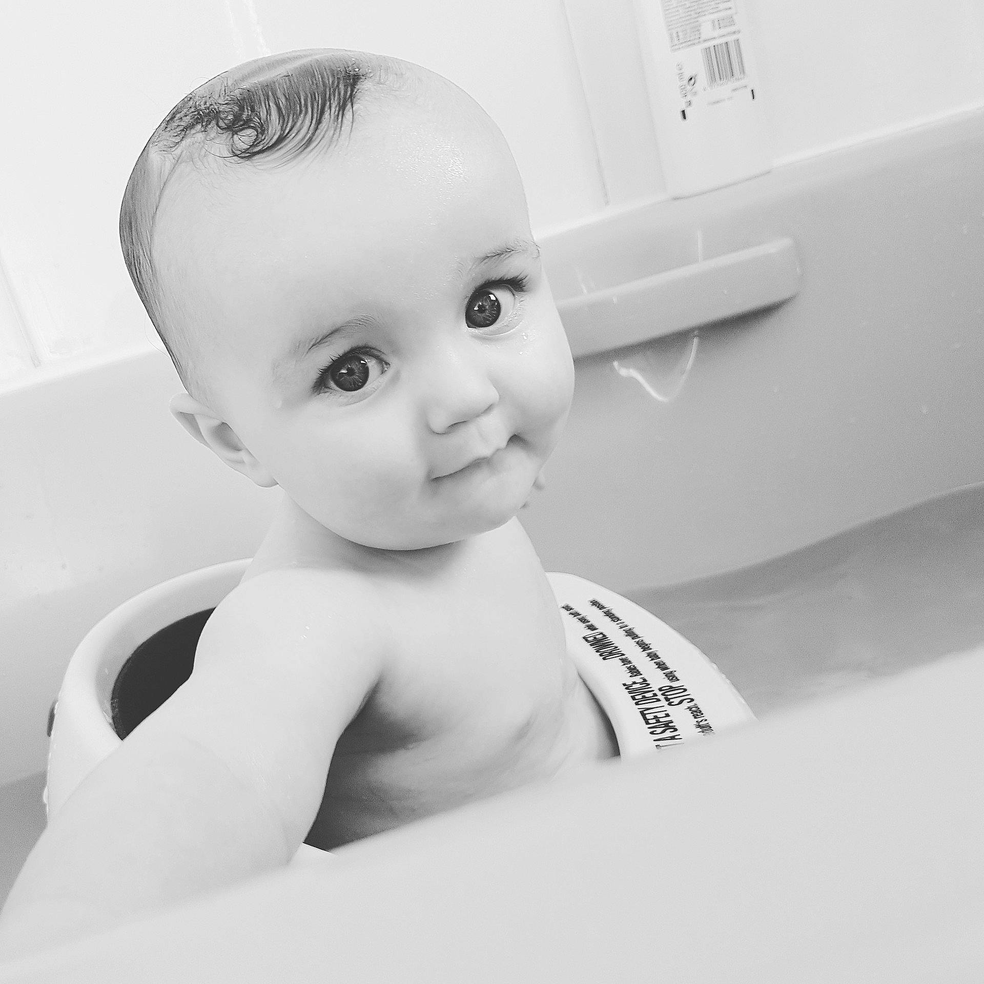 Caleb is registered to the contest to win money with this photo: black_and_white, child, eye, face, girl, hand, infant, monochrome, monochrome_photography, person, photograph, photography, toddler, white