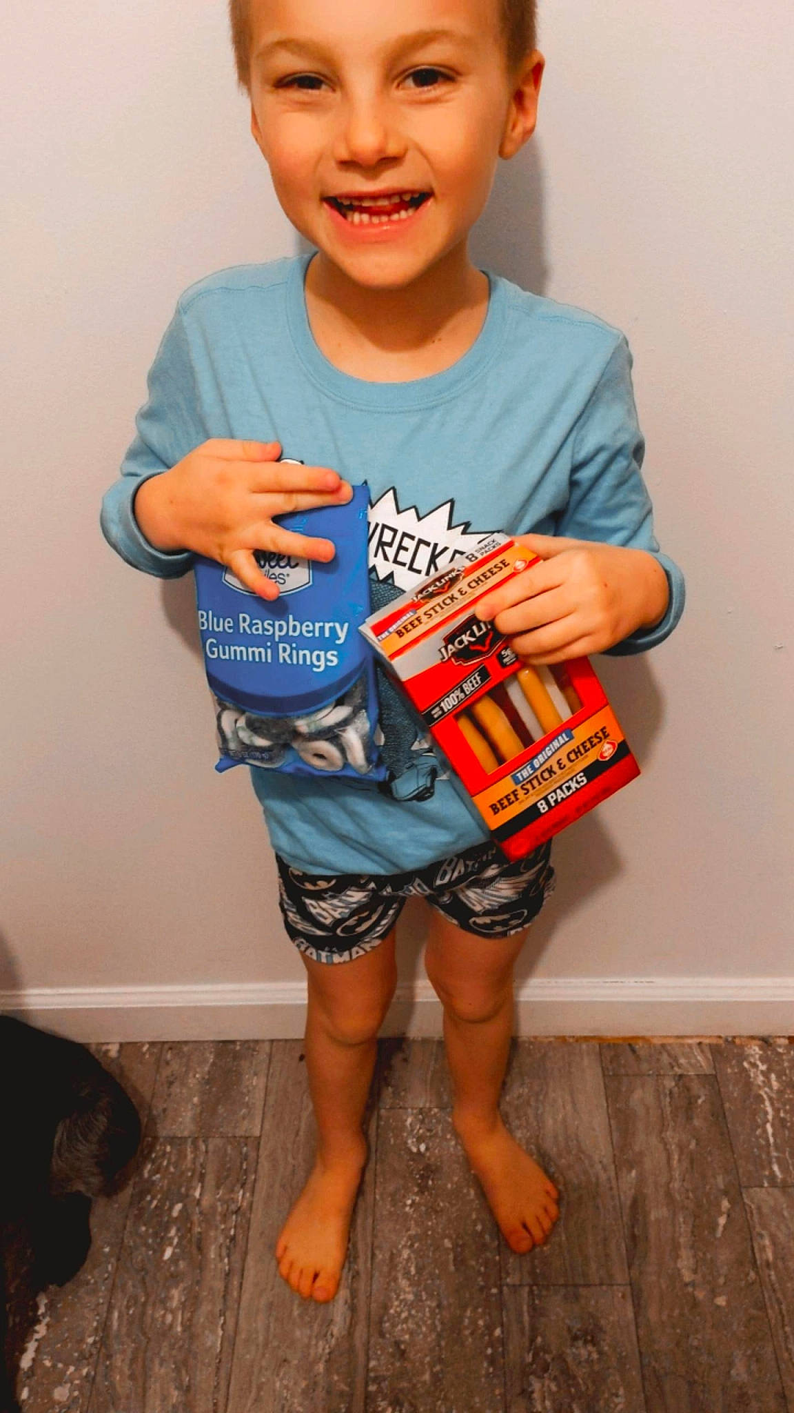 Chevy is registered to the contest to win money with this photo: arm, baby_toddler_clothing, finger, hand, happy, headwear, human_body, joint, joy, knee, leg, neck, orange, person, shorts, shoulder, skin, sleeve, smile, t_shirt