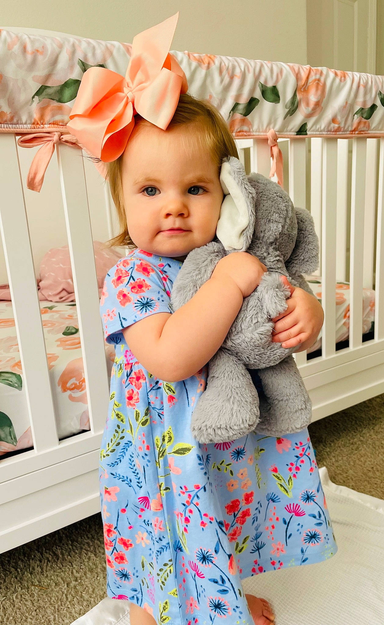 Avery is registered to the contest to win money with this photo: baby, baby_toddler_clothing, clothing, dress, face, facial_expression, happy, orange, organ, outerwear, pattern, person, pink, product, skin, sleeve, standing, t_shirt, textile, toddler