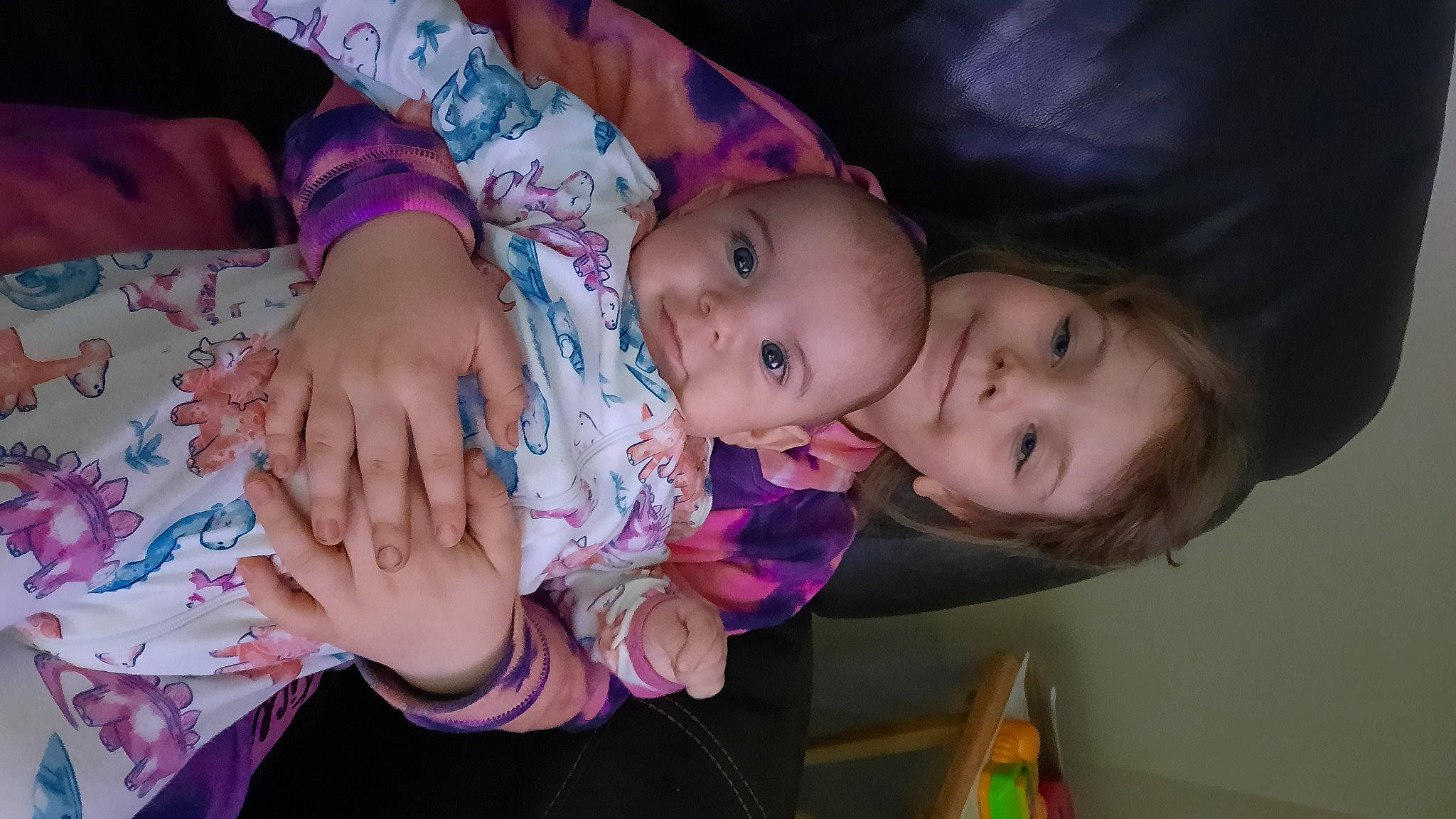 Katelyn Pace is registered to the contest to win money with this photo: baby, baby_toddler_clothing, beauty, cheek, child, finger, fun, happy, iris, joy, lip, nail, nose, pattern, person, pink, purple, room, skin, smile