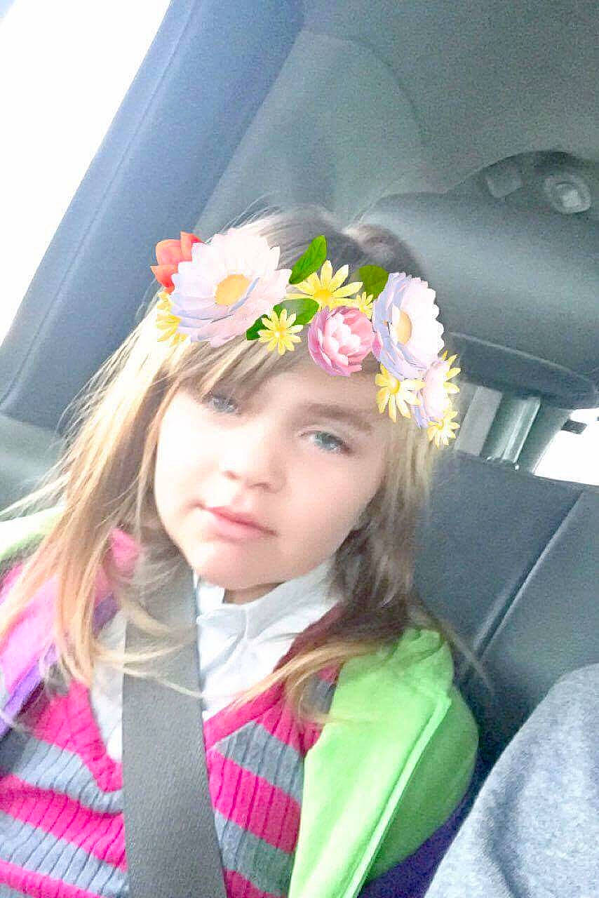 Peyton Mcdaniel is registered to the contest to win money with this photo: brown_hair, child, fashion_accessory, flower, fun, girl, hair, hair_accessory, hair_coloring, hairstyle, headband, headgear, headpiece, human_hair_color, person