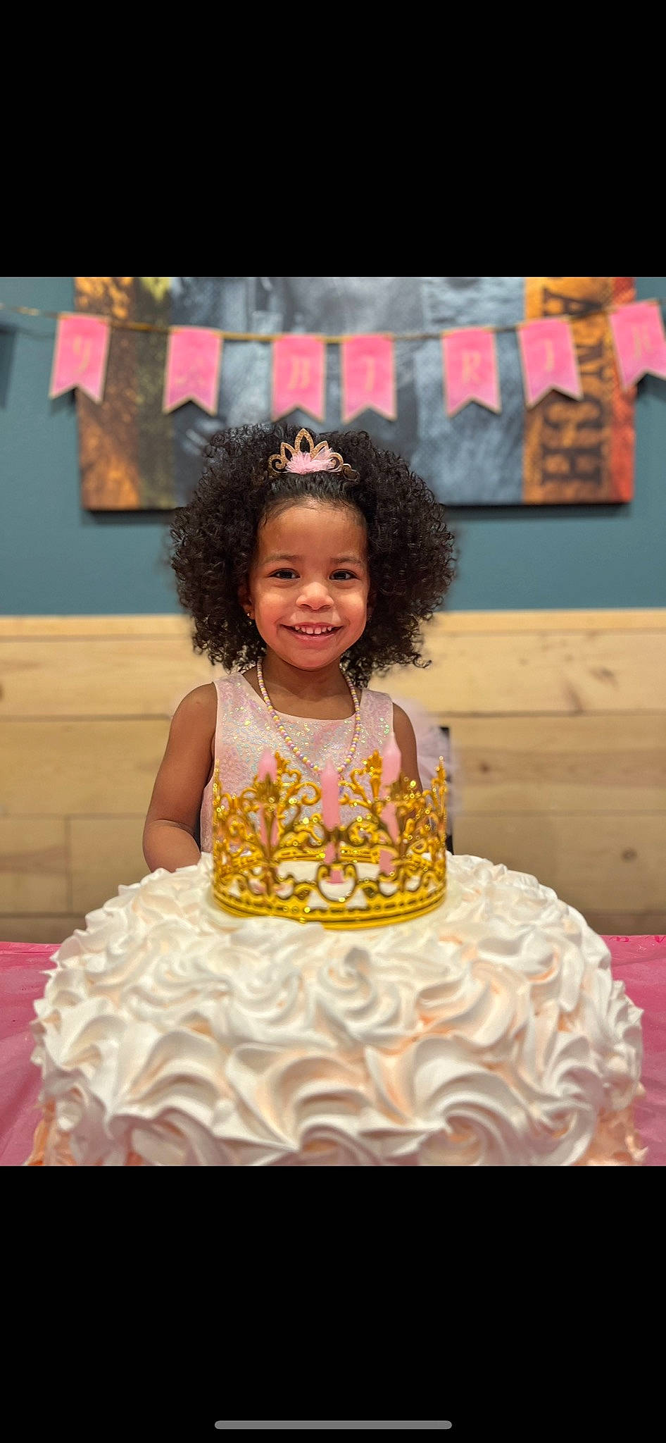Avianna is registered to the contest to win money with this photo: baby_toddler_clothing, birthday, buttercream, cake, cake_decorating, child, dress, event, face, fashion_design, formal_wear, fun, happy, joy, magenta, person, pink, ruffle, smile, sugar_cake