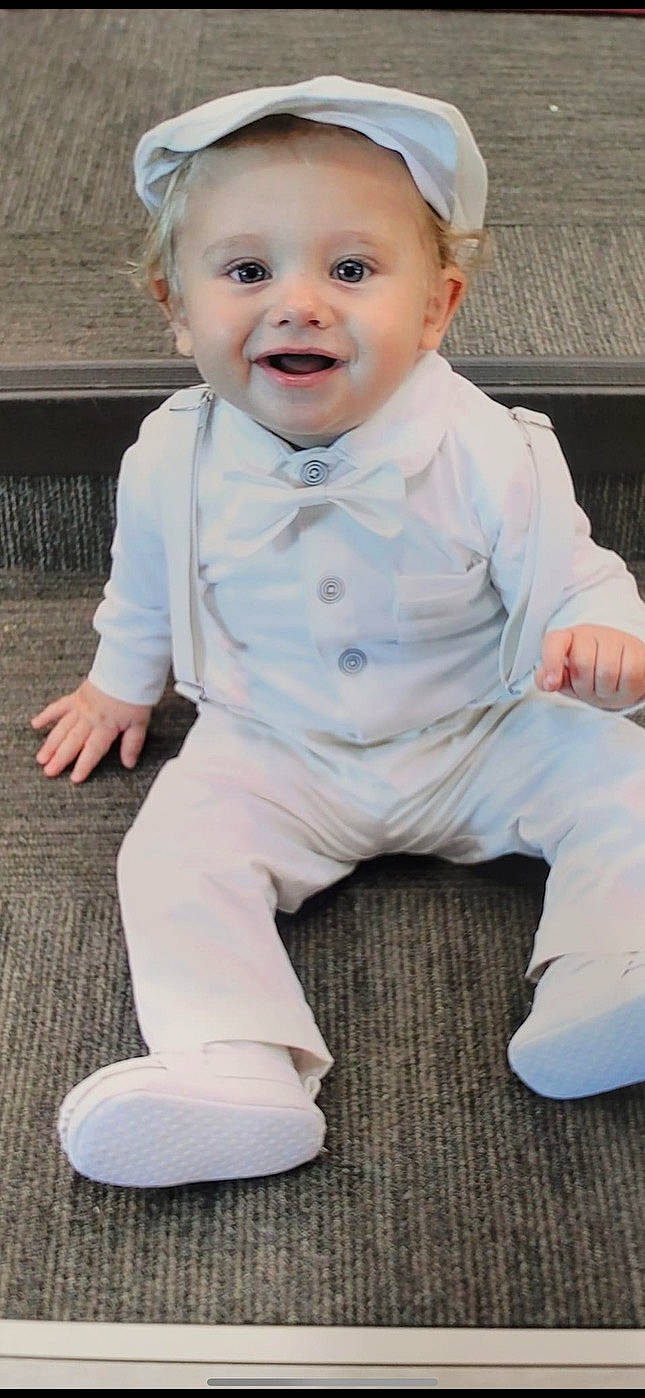 Leonardo joined the competition — help win amazing prizes! baby, baseballcap, cap, clothing, dress, face, footwear, formalwear, happy, hat, head, jeans, pants, person, photography, portrait, shirt, shoe, sitting, suit