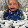 Ace joined the competition — help win amazing prizes! baby, smiling, blanket, stars, onesie, colorful_clothing, infant, baby_seat, cozy, happy, child, indoor, portrait, cute, young_child, face, head, comfort, soft, warm