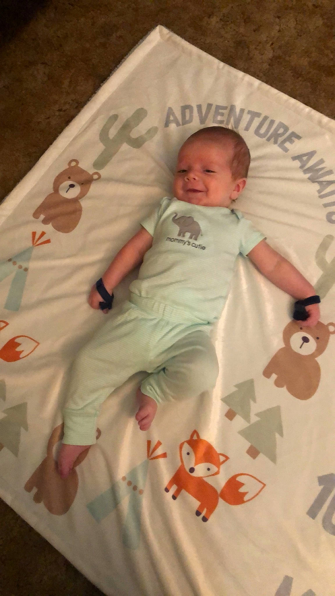 Brentlee is registered to the contest to win money with this photo: baby, baby_products, baby_toddler_clothing, child, nap_mat, pattern, person, product, toddler