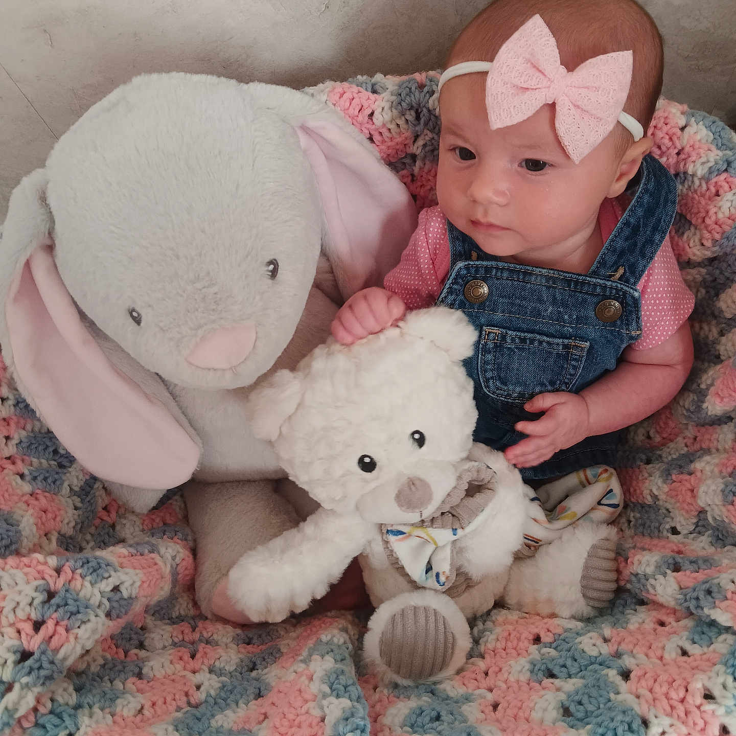 Rylie is registered to the contest to win money with this photo: accessories, baby, bed, blanket, clothing, couch, cushion, face, furniture, hat, head, homedecor, jeans, pants, person, photography, plush, portrait, teddybear, toy