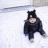 Enzo participe au concours pour gagner de l'argent avec cette photo : child, toddler, snow, winter_clothing, black_snowsuit, hat, mickey_mouse, gloves, shoes, outdoor, cold_weather, sitting, cute, smiling, snowy_ground, winter, playful, baby, face, headwear