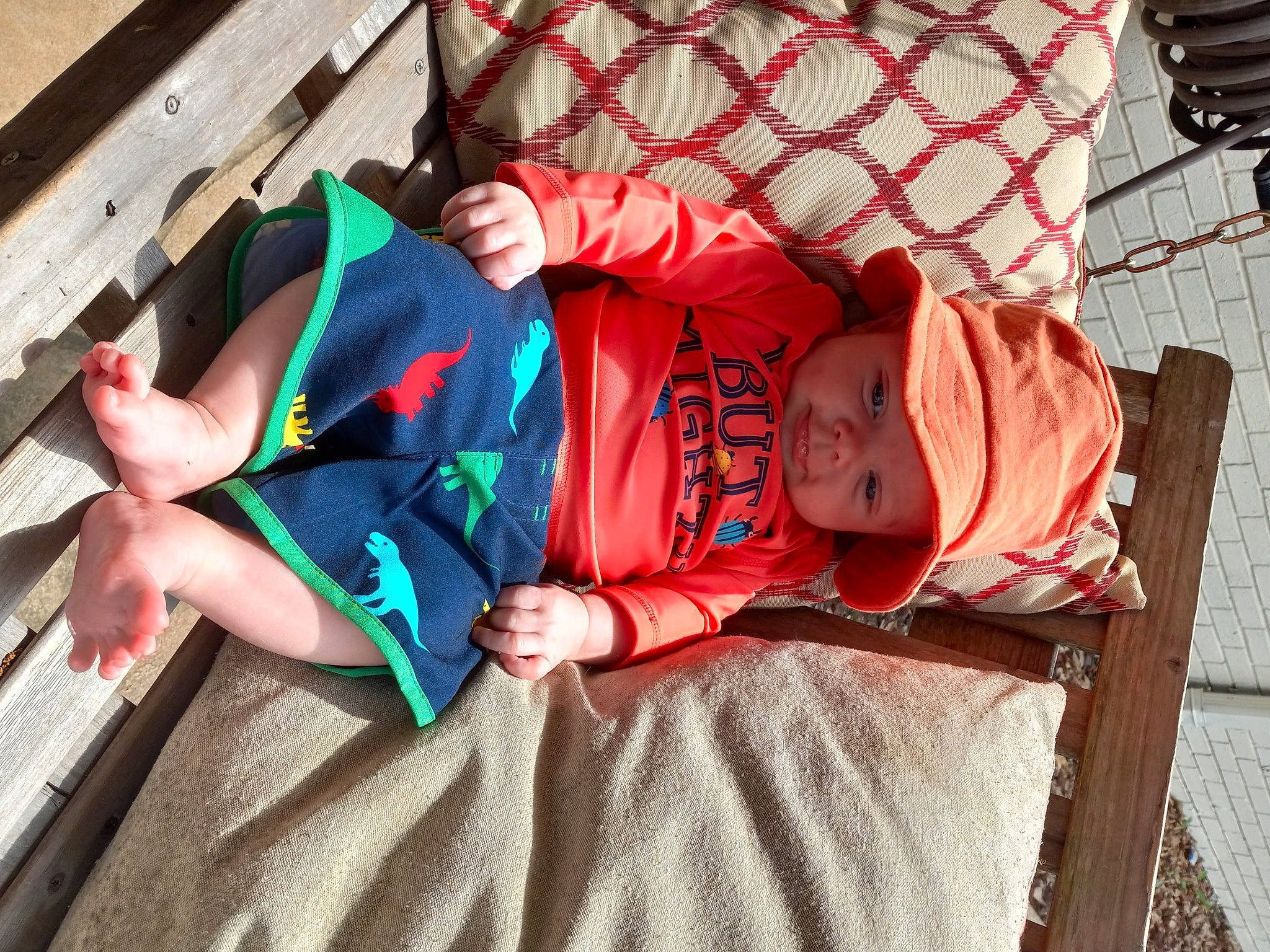 Rhett joined the competition — help win amazing prizes! baby, baby_products, baby_toddler_clothing, carmine, child, clothing, comfort, foot, fun, headwear, human_body, human_leg, leg, leisure, orange, pattern, person, sitting, thigh, toddler