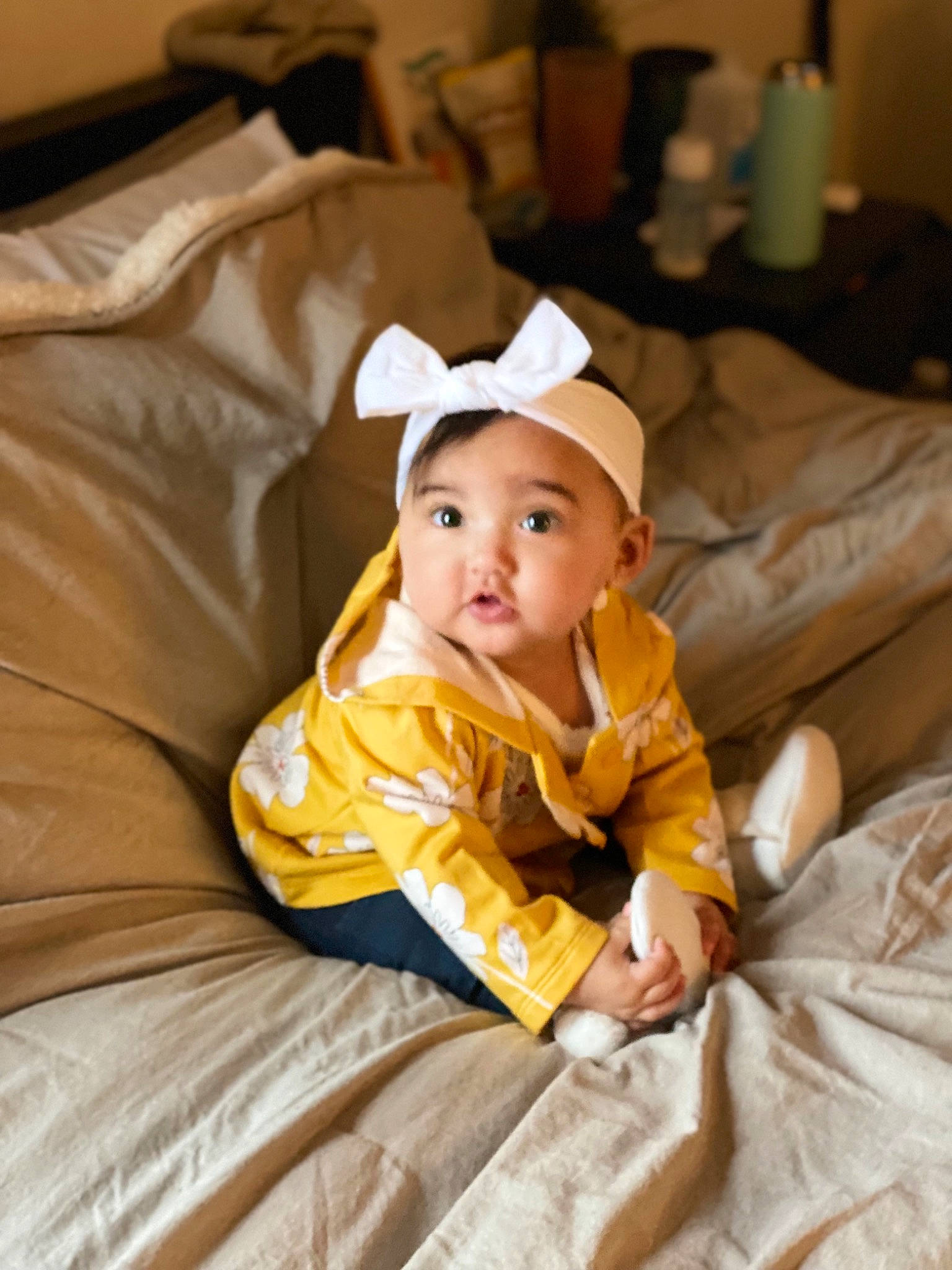 Melanie joined the competition — help win amazing prizes! baby, baby_toddler_clothing, child, comfort, fun, hat, lap, linens, person, room, sitting, toddler, tree, vacation, wood