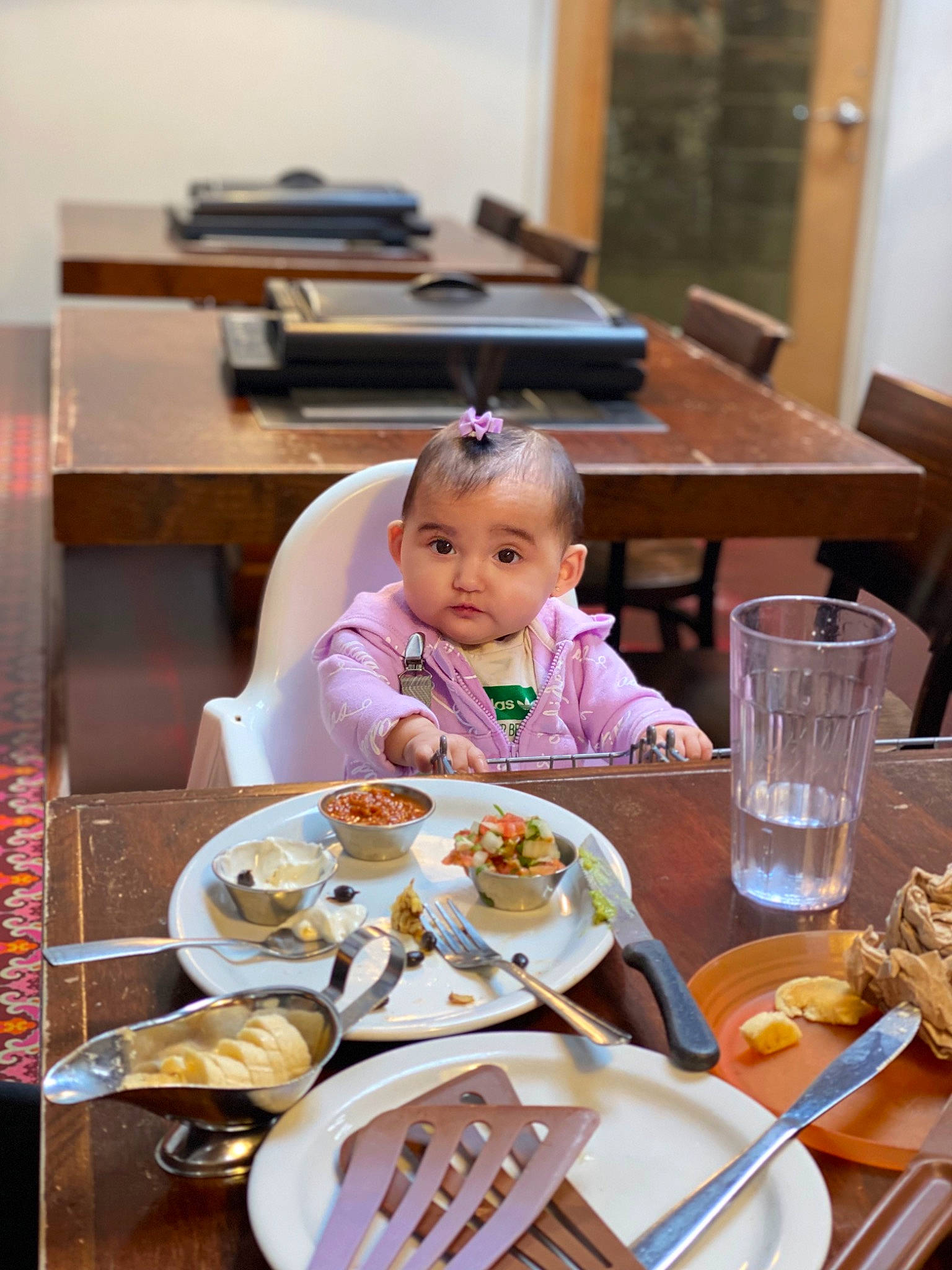 Melanie is registered to the contest to win money with this photo: baby, bowl, chair, comfort_food, cuisine, cup, cutlery, dish, dishware, drinkware, event, food, fork, kitchen_utensil, person, plate, serveware, spoon, table, tableware